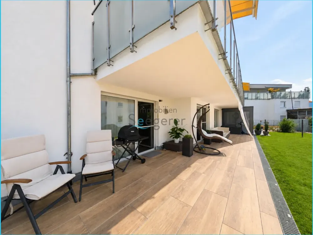 Immobilien Seegerer: Modern 4-Room Ground Floor Apartment with Garden and approx. 50 m² Terrace Area