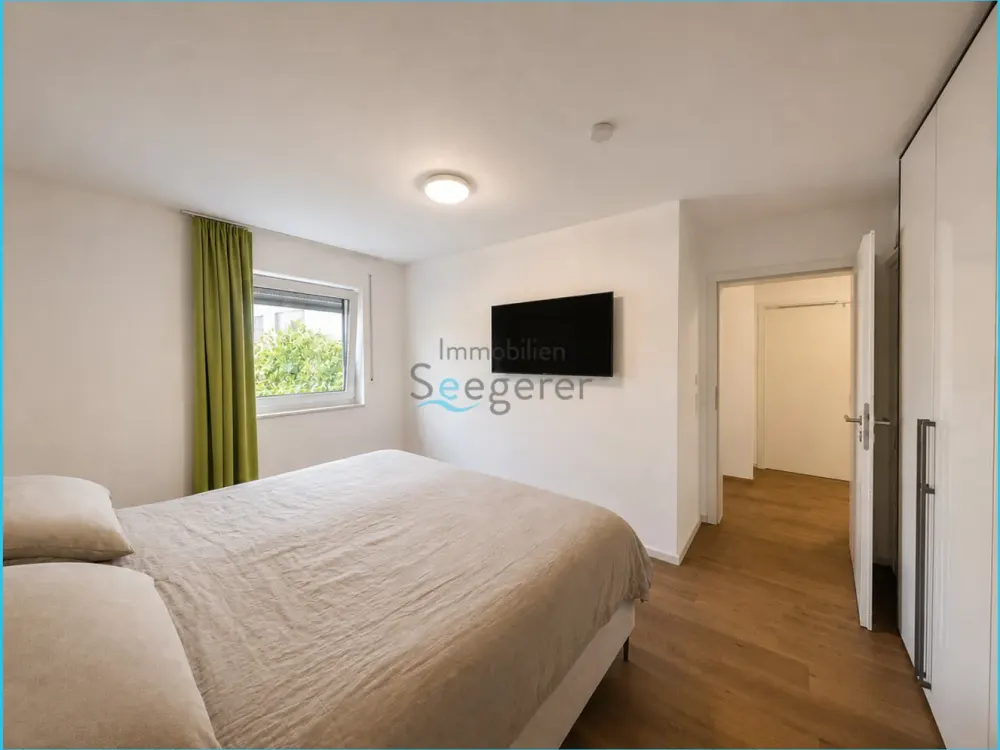 Immobilien Seegerer: Modern 4-Room Ground Floor Apartment with Garden and approx. 50 m² Terrace Area