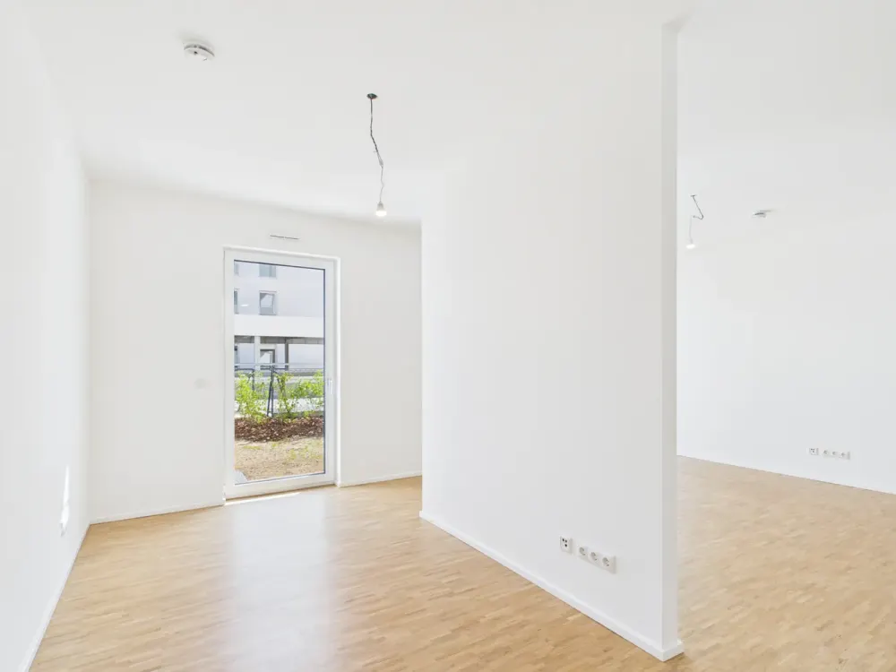 großzügig geschnittene 1,5-Zimmer-Wohnung mit Garten *NEUBAU*