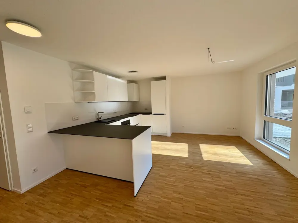 Moderne 3-Zimmer-Wohnung mit Terrasse und Garten