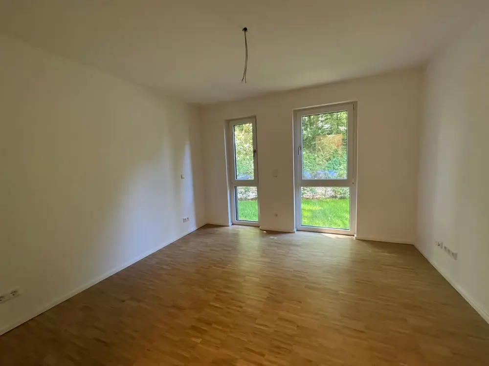 Moderne 3-Zimmer-Wohnung mit Terrasse und Garten