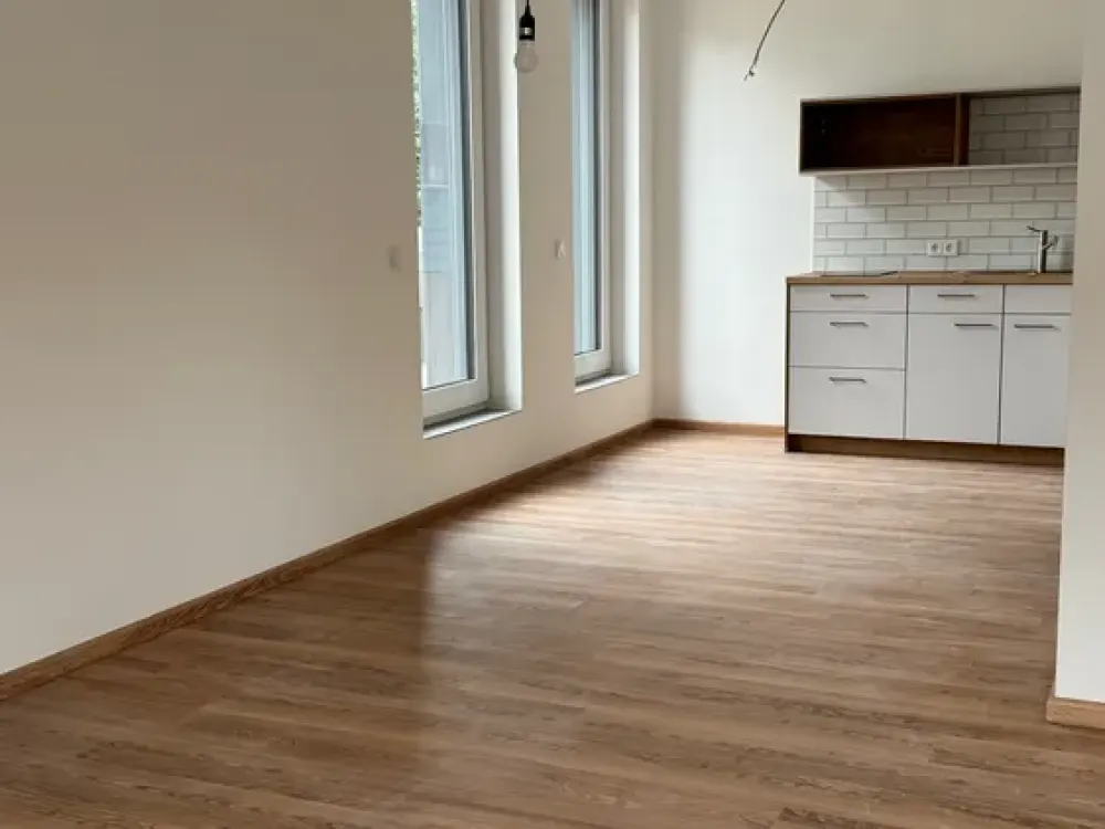 Erstbezug: Helle 1-Zimmer-Wohnung mit Terrassenabteil im Erdgeschoss