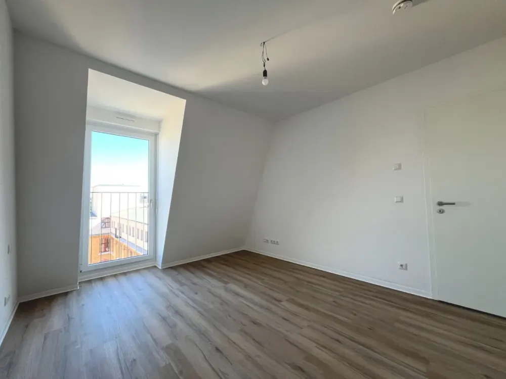 New Build: Modern 3-Room Apartment with Daylight Bathroom and Loggia in Zentrum-Ost | Optional with Fitted Kitchen