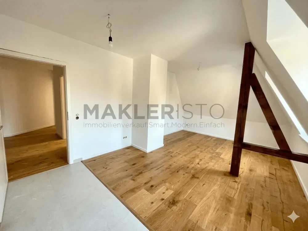 Modernized 2.5-Room Attic Apartment with Open Living Kitchen & Underfloor Heating