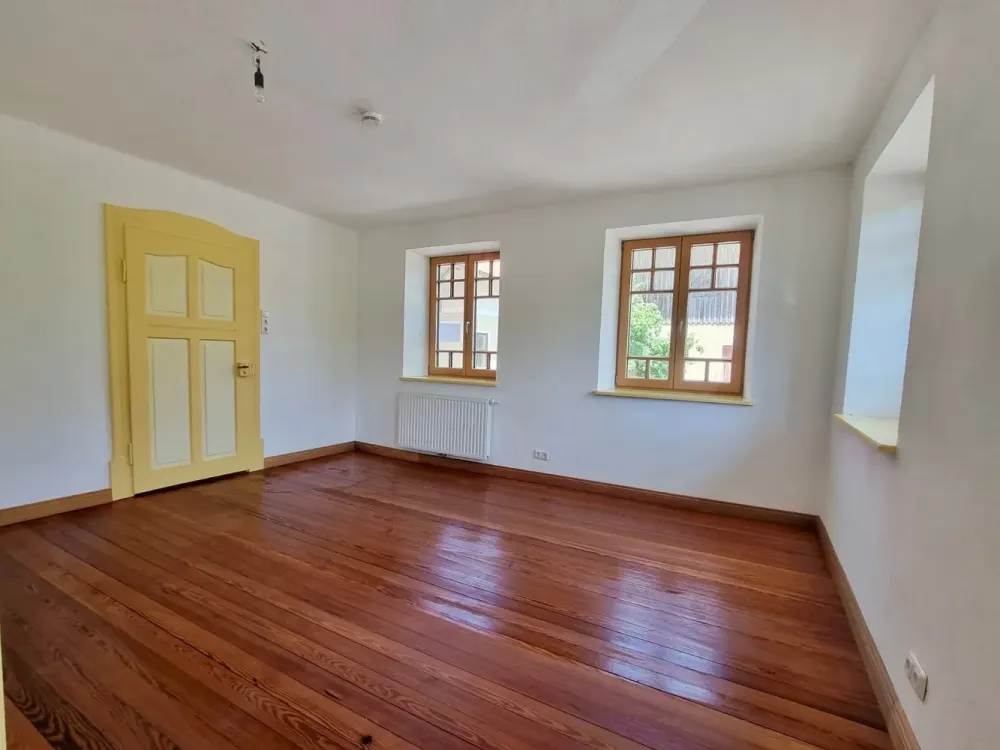 Special Living in Idyllic Location: Spacious Ground Floor Apartment with Charm