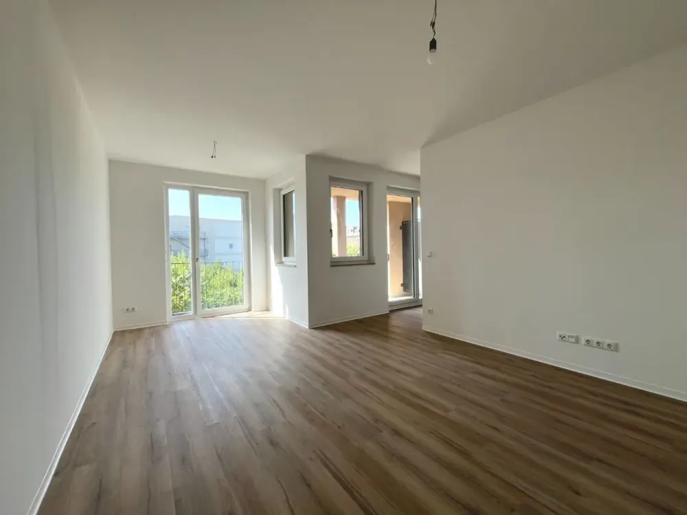 New Build: Modern 3-Room Apartment with Daylight Bathroom and Loggia in Zentrum-Ost | Optional with Fitted Kitchen