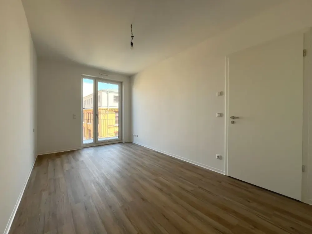 New Build: Modern 3-Room Apartment with Daylight Bathroom and Loggia in Zentrum-Ost | Optional with Fitted Kitchen
