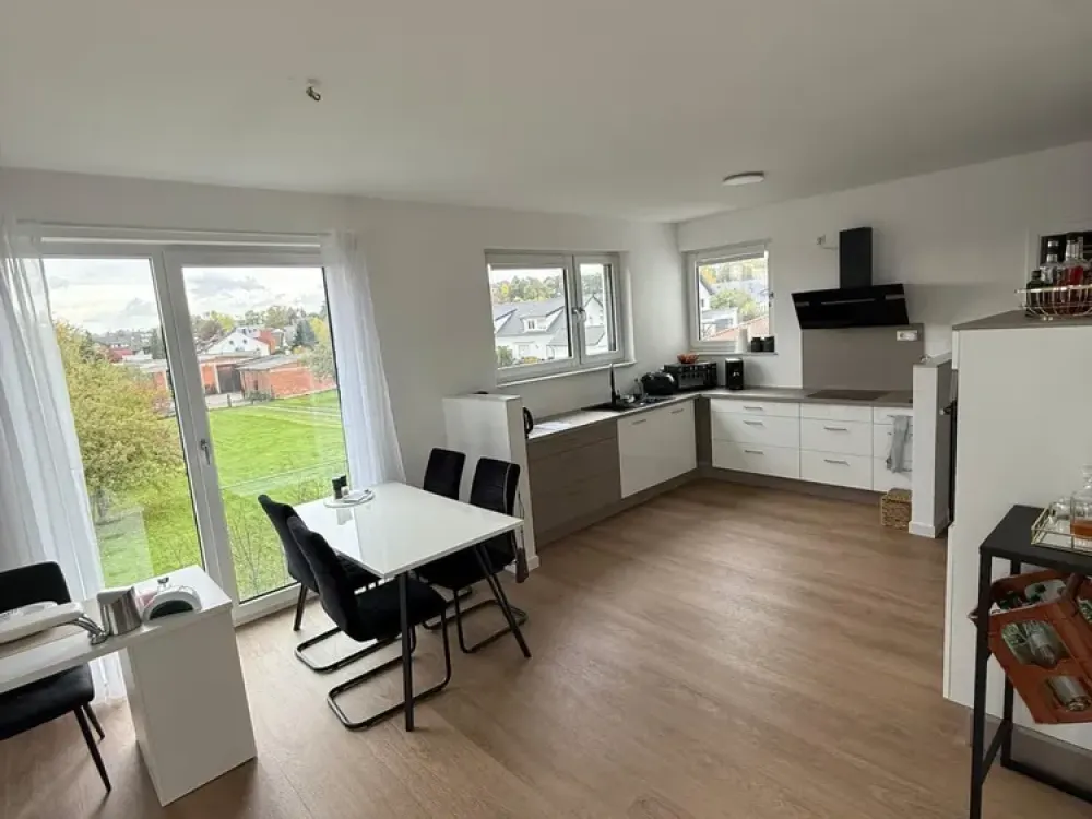 Modern barrier-free 3-room apartment with large south-facing balcony and panoramic view, quiet but central