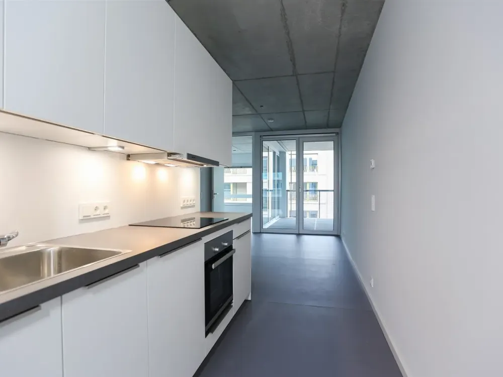 Traumhaft helle Citywohnung mit stylischen Sichtbetondecken im 6. OG eines modernen Neubaus