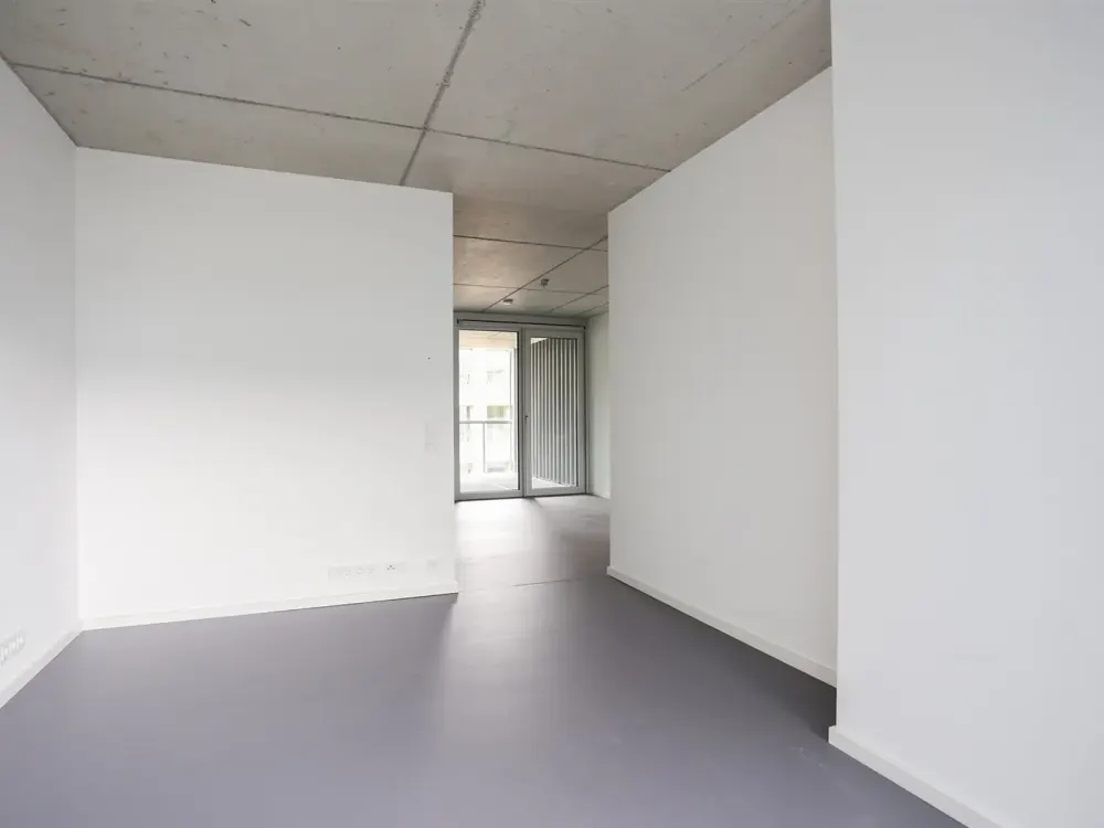 Traumhaft helle Citywohnung mit stylischen Sichtbetondecken im 6. OG eines modernen Neubaus