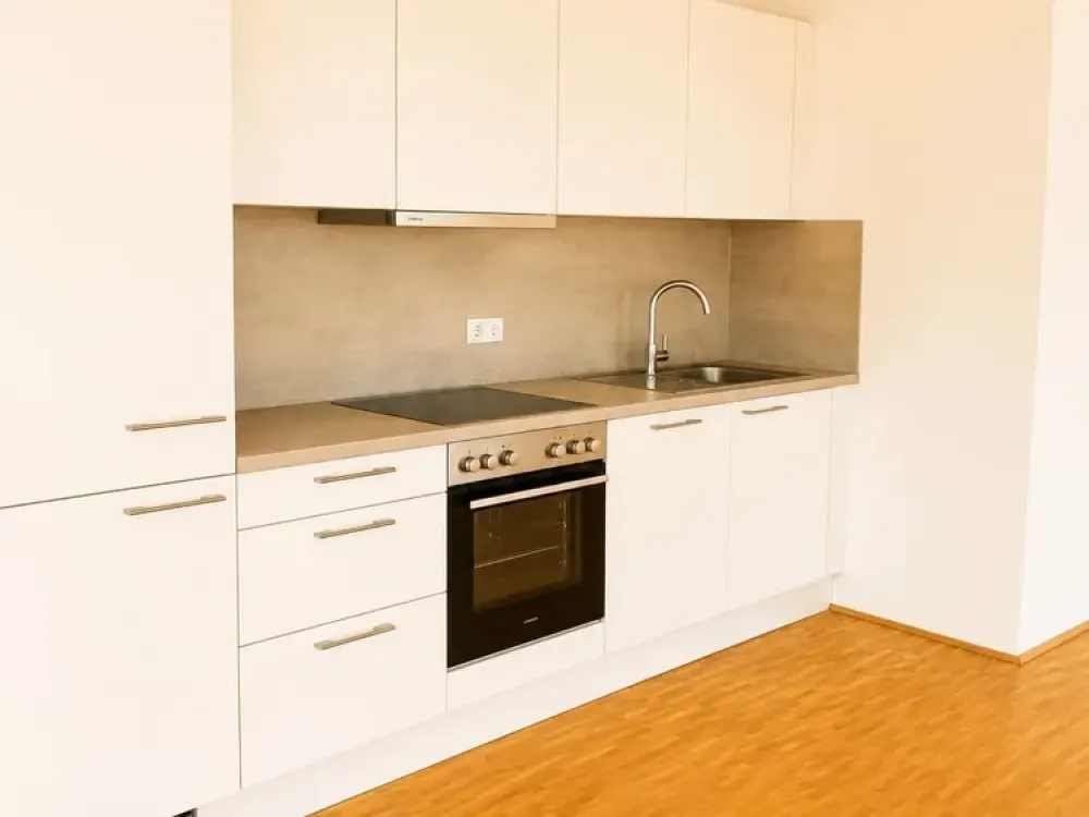 Attractive 4-Room Apartment with Balcony and Fitted Kitchen