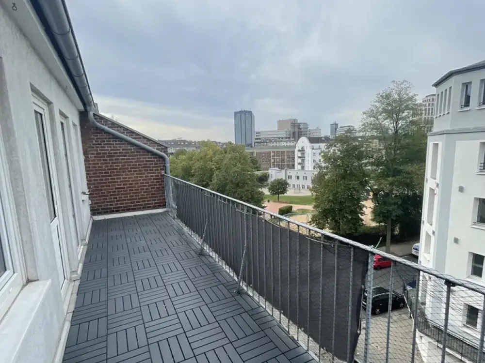 Small Apartment Above the Roofs of Düsseldorf