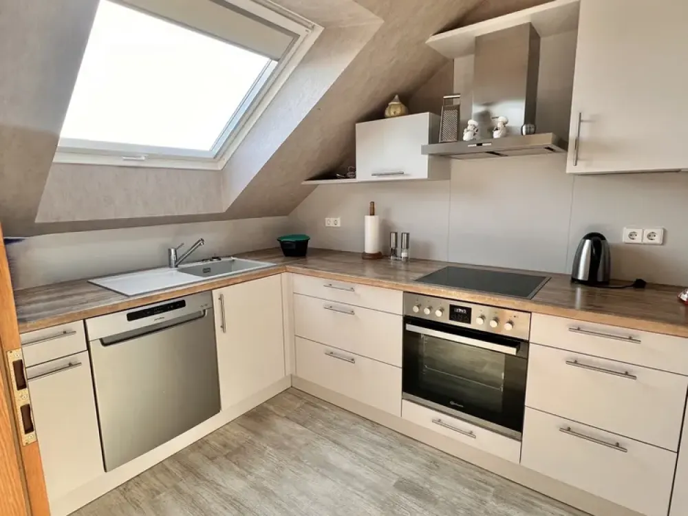 WELL-MAINTAINED ATTIC APARTMENT IN A PREFERRED LOCATION OF RÜLZHEIM