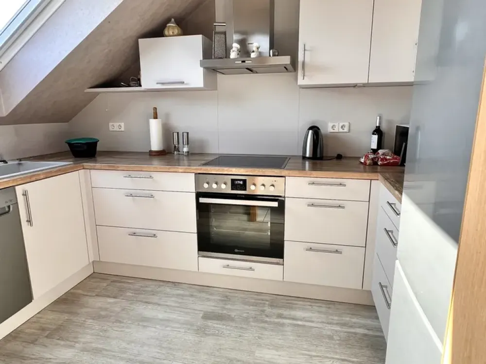 WELL-MAINTAINED ATTIC APARTMENT IN A PREFERRED LOCATION OF RÜLZHEIM