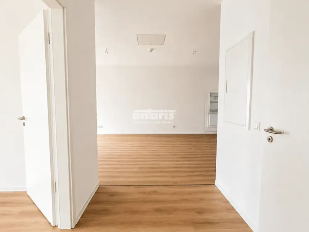antaris Immobilien GmbH ** Modern & cozy: 2-room apartment with fitted kitchen **