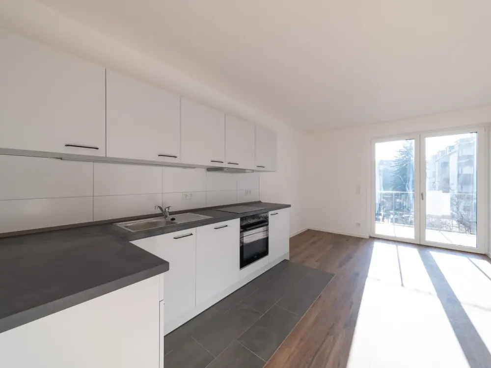 2 Raumwohnung mit Einbauküche, Sonnenbalkon und Tiefgaragenstellplatz - WE14