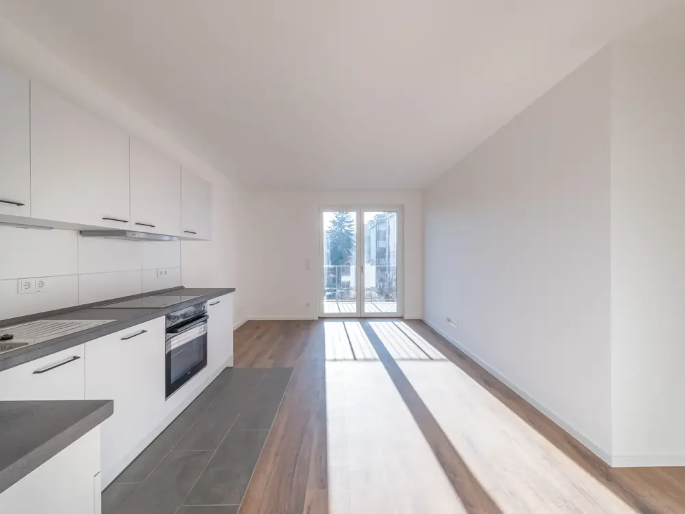 2-room apartment with fitted kitchen, sunny balcony and underground parking space - WE14