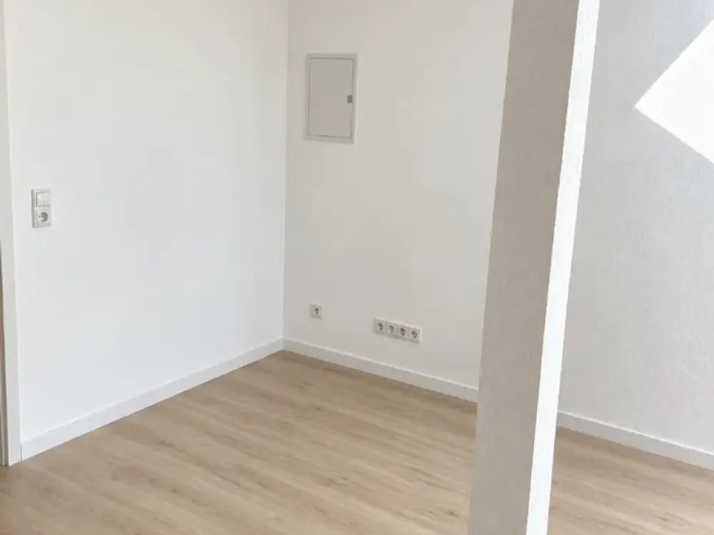 Freshly Renovated 1-Room Attic Apartment with Built-In Kitchen