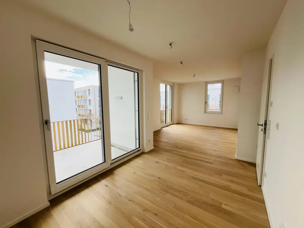 Neubau: Hochwertige 2-Zi.-Whg. mit Premium Küche, Südloggia & TG-Einzelstpl. in München-Feldmoching