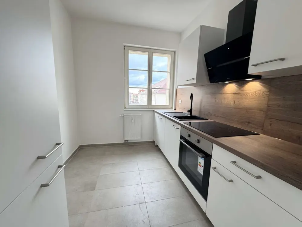 First Occupancy After Modernization - New Built-in Kitchen Included!