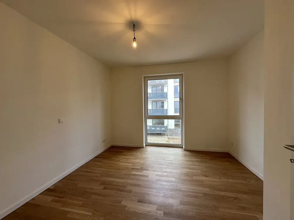 KfW 40 New-Build Apartment with Fitted Kitchen, South Balcony, Real Wood Parquet, Elevator, Underground Parking