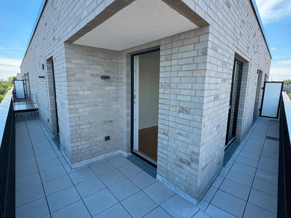 First Occupancy: Partially Furnished Penthouse Above the Roofs of Hamburg