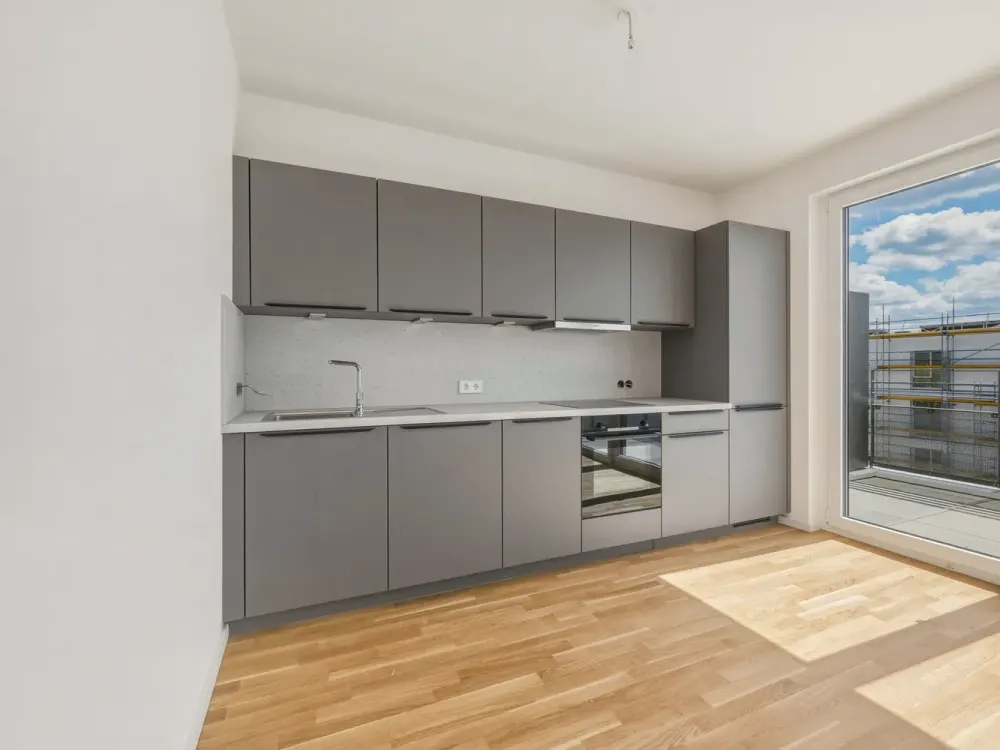 3-Zi-DG-Wohnung mit EBK, Stellplatz und hochwertiger Ausstattung