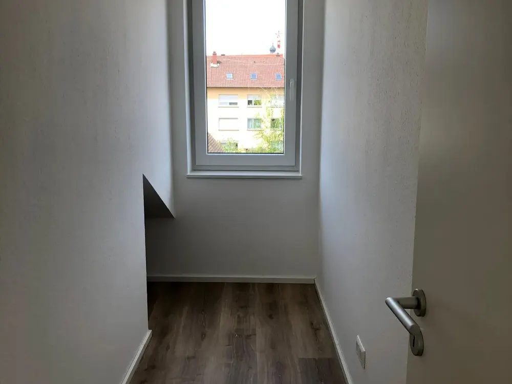Cozy Top-Floor Apartment in Central Location of Bruchsal Including Fitted Kitchen and Parking Space