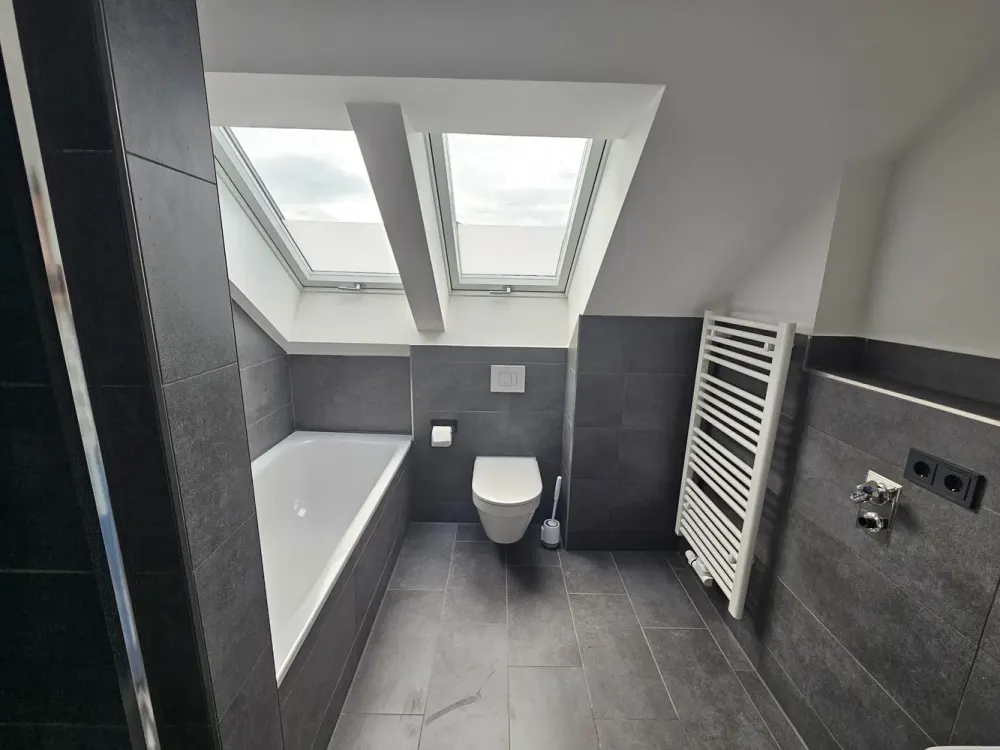 Stylish 3-Room Maisonette Apartment with Top Features in München Alt-Riem