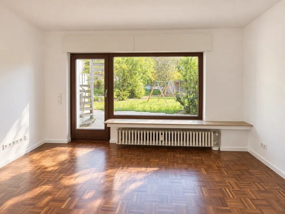 Erdgeschosswohnung mit Einbauküche, eigener Terrasse, Gartenteil und Stellplatz in Köln