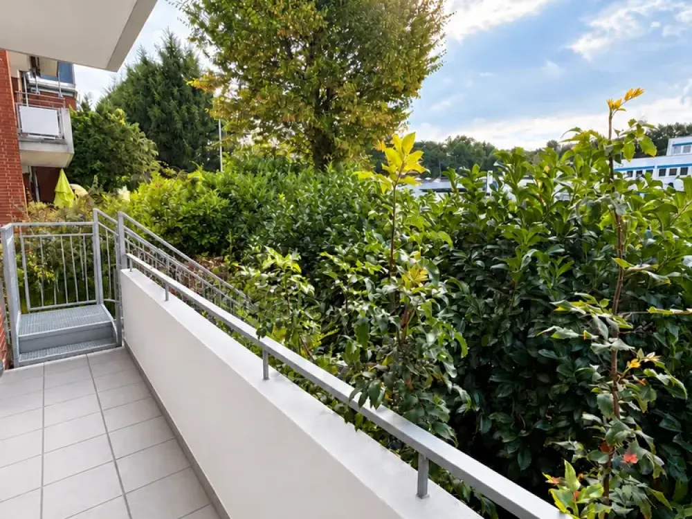 Spacious 2-Room Ground Floor Apartment with Balcony, Direct Garden Access and Garage