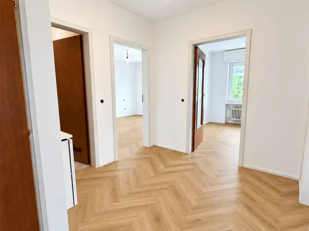Spacious 2-Room Ground Floor Apartment with Balcony, Direct Garden Access and Garage