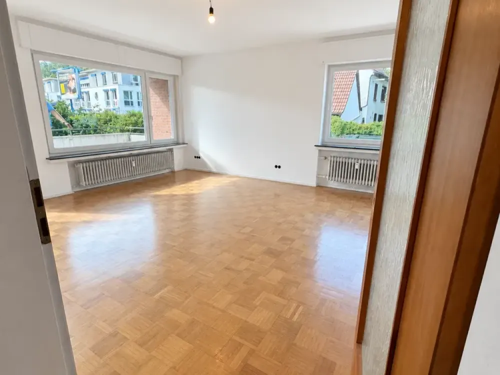 Spacious 2-Room Ground Floor Apartment with Balcony, Direct Garden Access and Garage