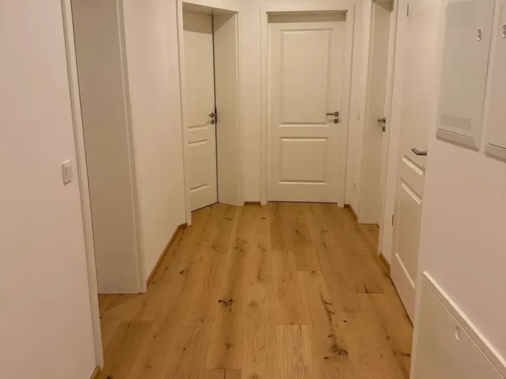EXCLUSIVE 2.5-ROOM APARTMENT-PARQUET-HIGH-QUALITY FITTED KITCHEN-BALCONY-HEAT PUMP-PARKING SPACE