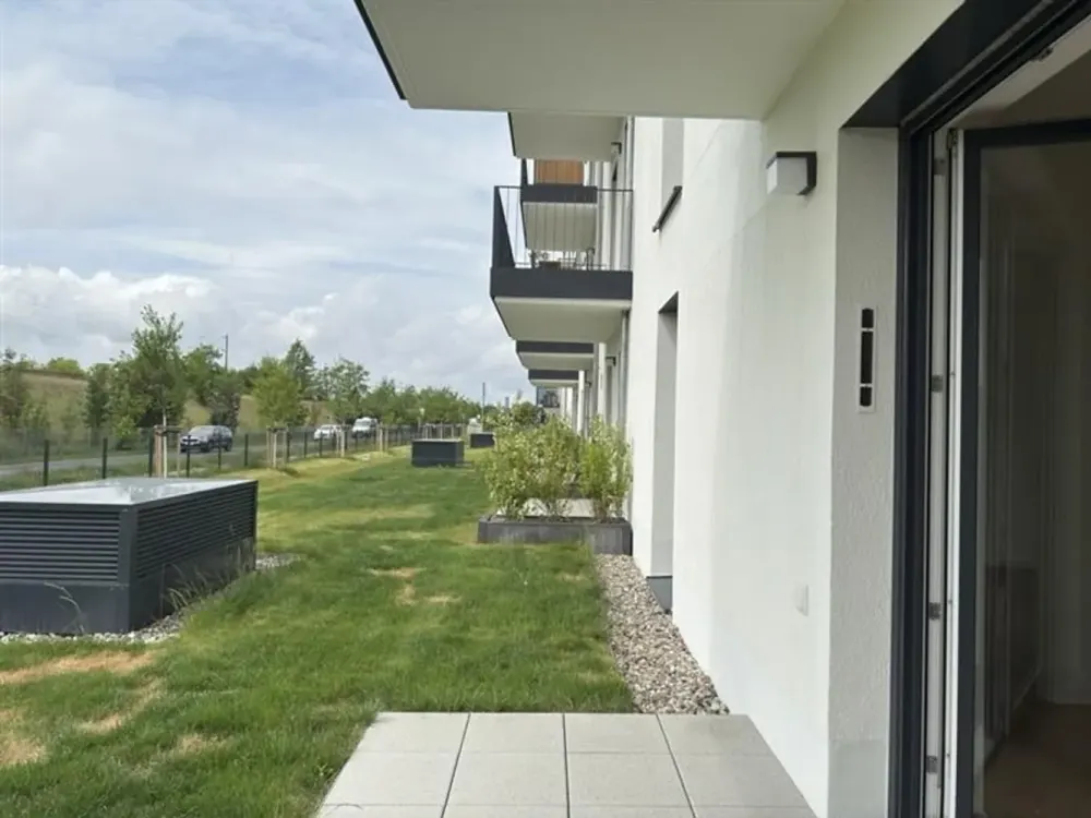 2-Room Apartment with Balcony and Built-in Kitchen on the Ground Floor