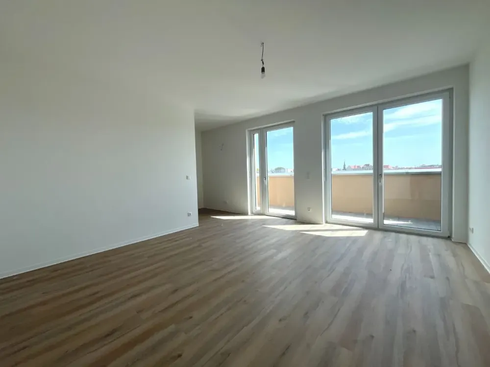 2-Room New-Build Apartment with Daylight Bathroom and Spacious Roof Terrace in the Center | Optional Fitted Kitchen
