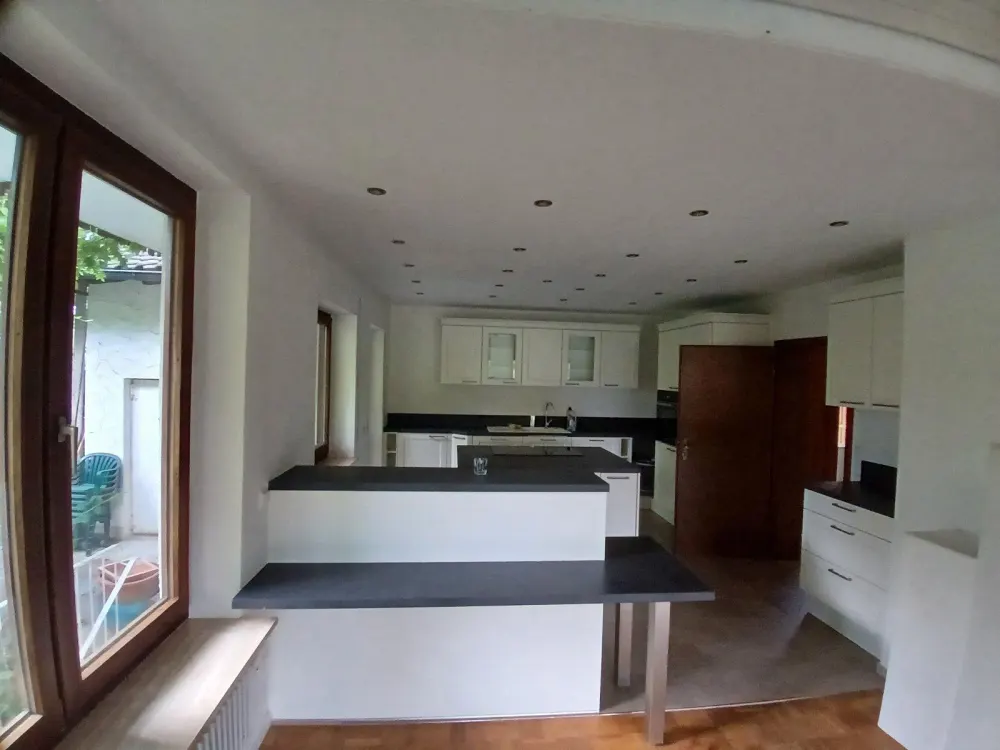 Spacious 8-Room Apartment with Large Garden in a Quiet Location