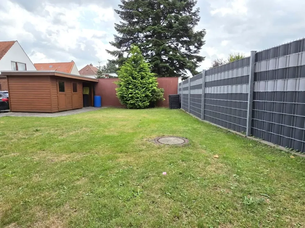 Ground-floor apartment with terrace and garden in central residential location!