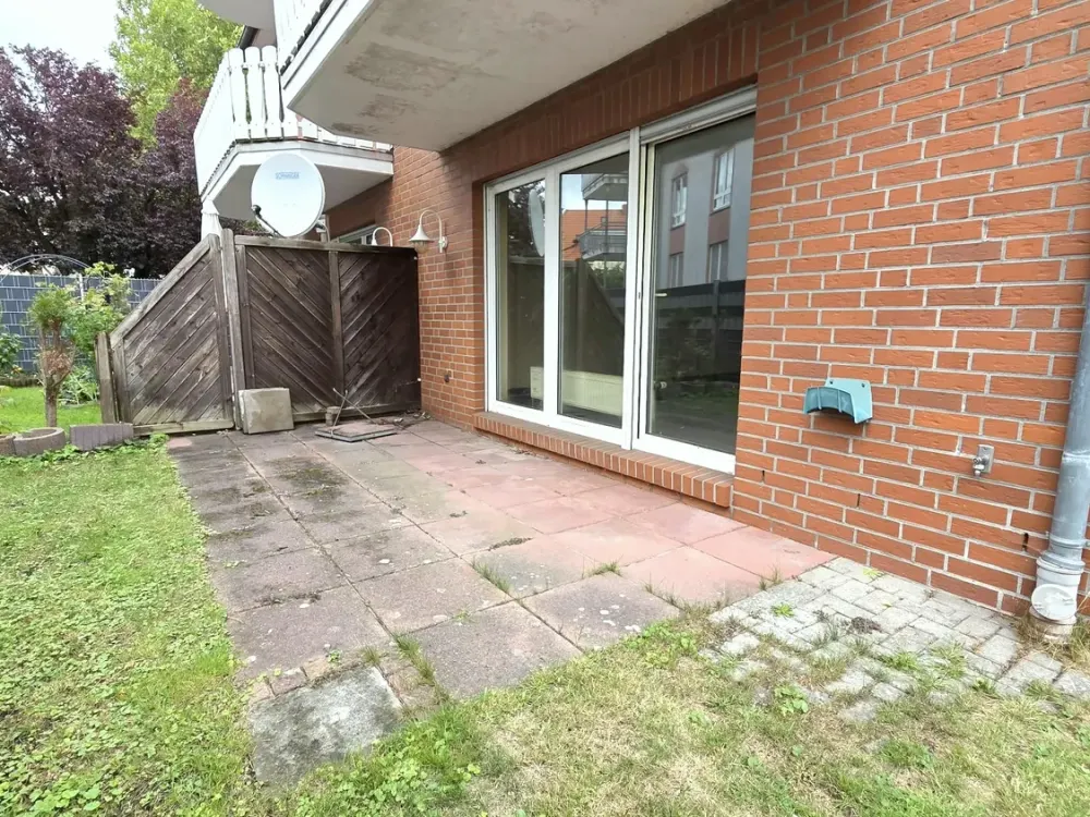 Ground-floor apartment with terrace and garden in central residential location!