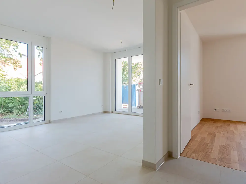 First occupancy! 2-room apartment with fitted kitchen, terrace and garden share