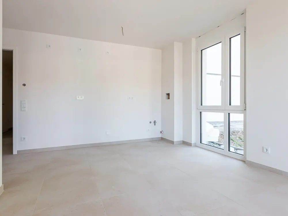 First occupancy! 2-room apartment with fitted kitchen, terrace and garden share