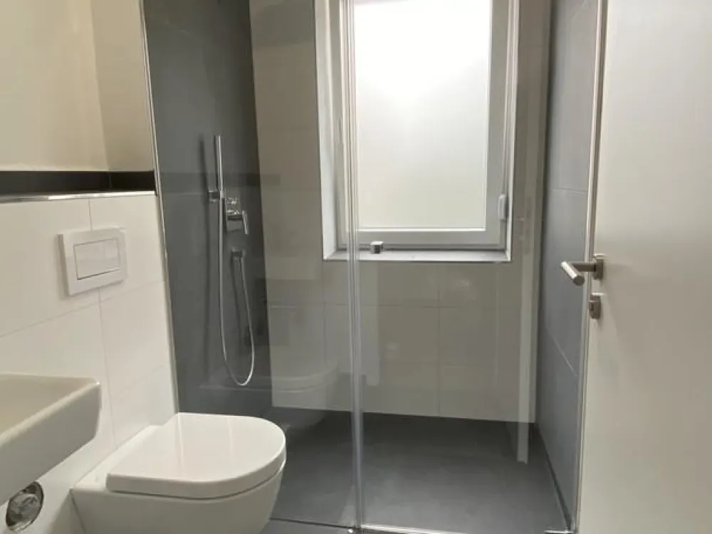 4-Room Apartment in Dream Location with Tiled Stove, Balcony, Roof Terrace, Guest Bathroom and Garage