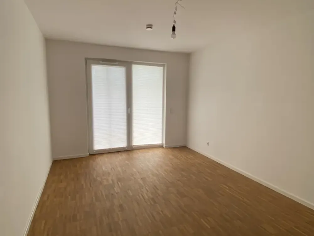 New Build 2023: Bright 2-Room Apartment with Balcony, Fitted Kitchen and Underground Parking Space