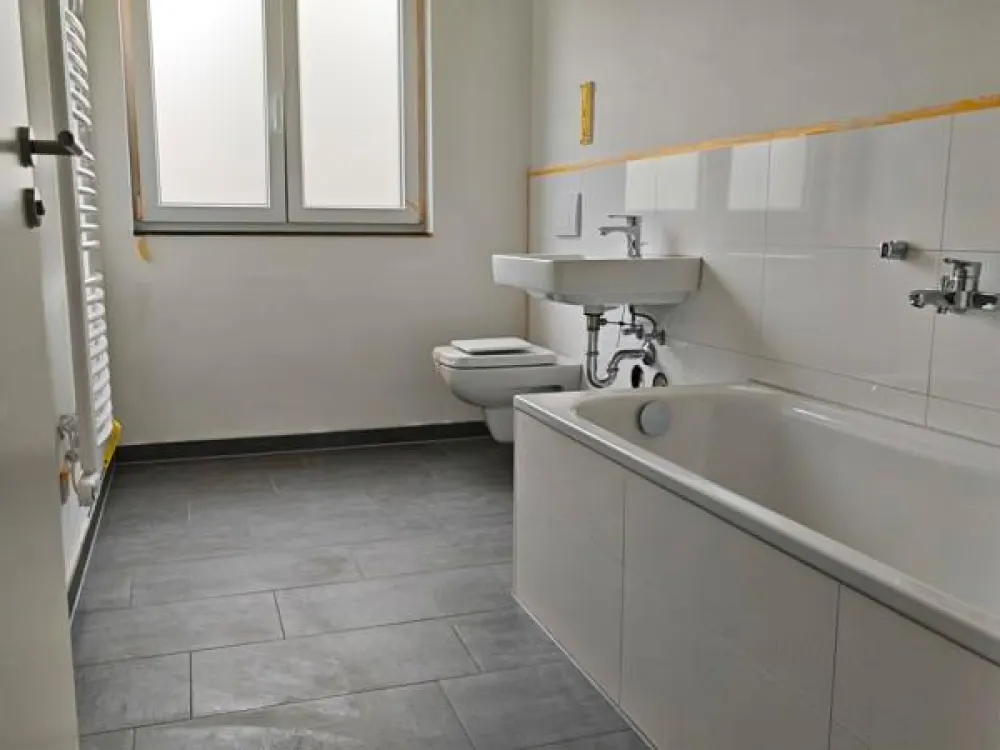 Move-in ready new building - 4-room upper floor apartment with balcony, ground level