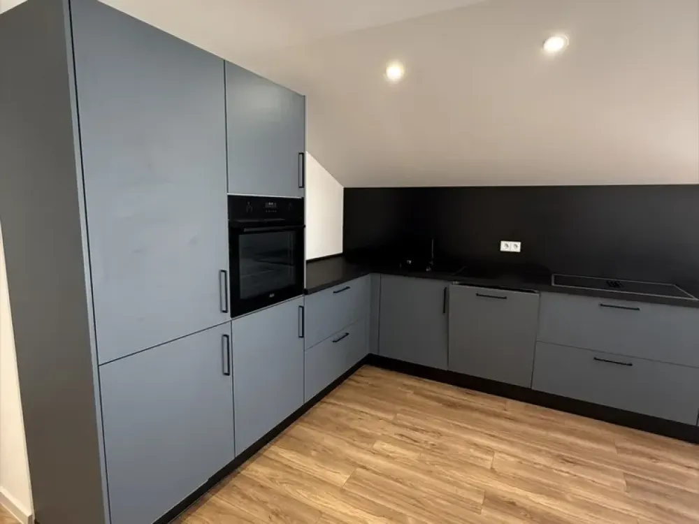 Modern 2.5-Room Apartment in Tower with Balcony, Air Conditioning, New Kitchen & Underground Parking Space