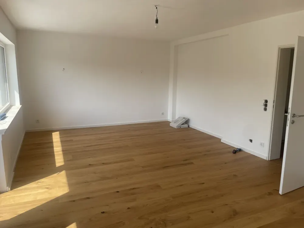 First Occupancy After Complete Renovation: High-Quality 2.5-Room Apartment with Balcony, Smart Home & Parking Space