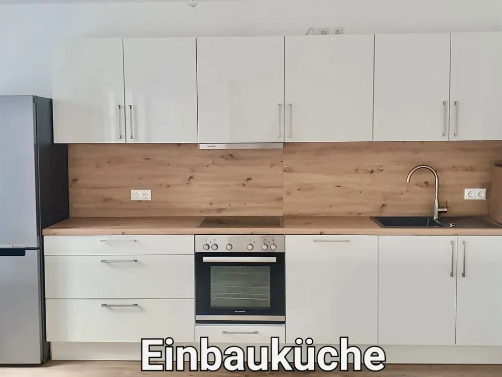 Beautiful bright 3-room apartment with large southwest balcony and fitted kitchen - parking spaces in parking garage