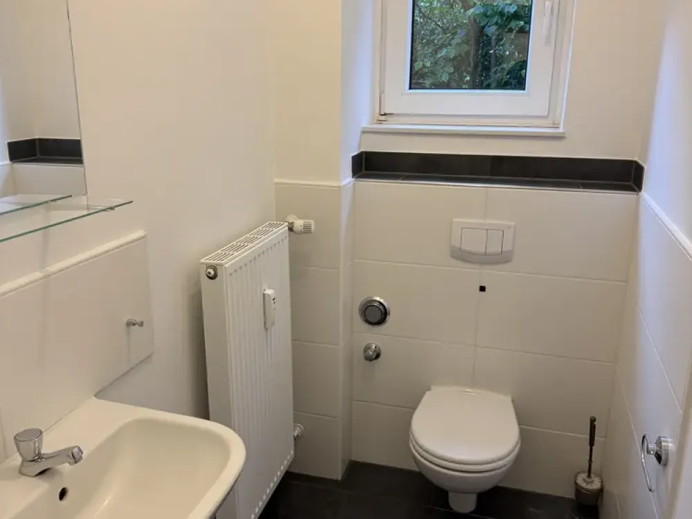 Bright 3-Room Apartment with Balcony. Shower Bath. Guest WC. Garage.