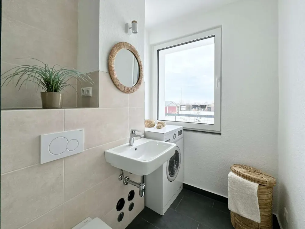 First occupancy after renovation: Modern 2-room apartment with fitted kitchen, balcony and parking space