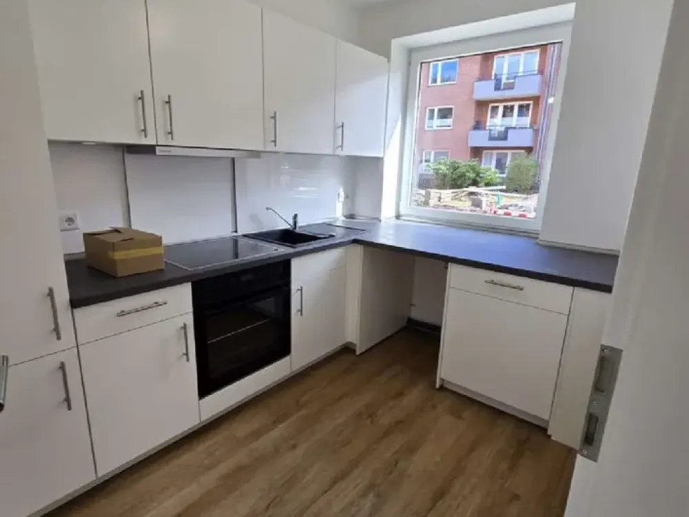 Familiär und im Grünen - neu sanierte 2,5-Zimmer-Erdgeschoss-Wohnung